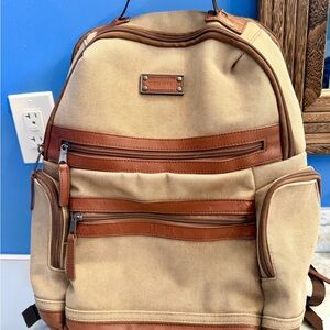 Renwick Canvas and Leather Backpack With Laptop Compartment And Luggage Tag